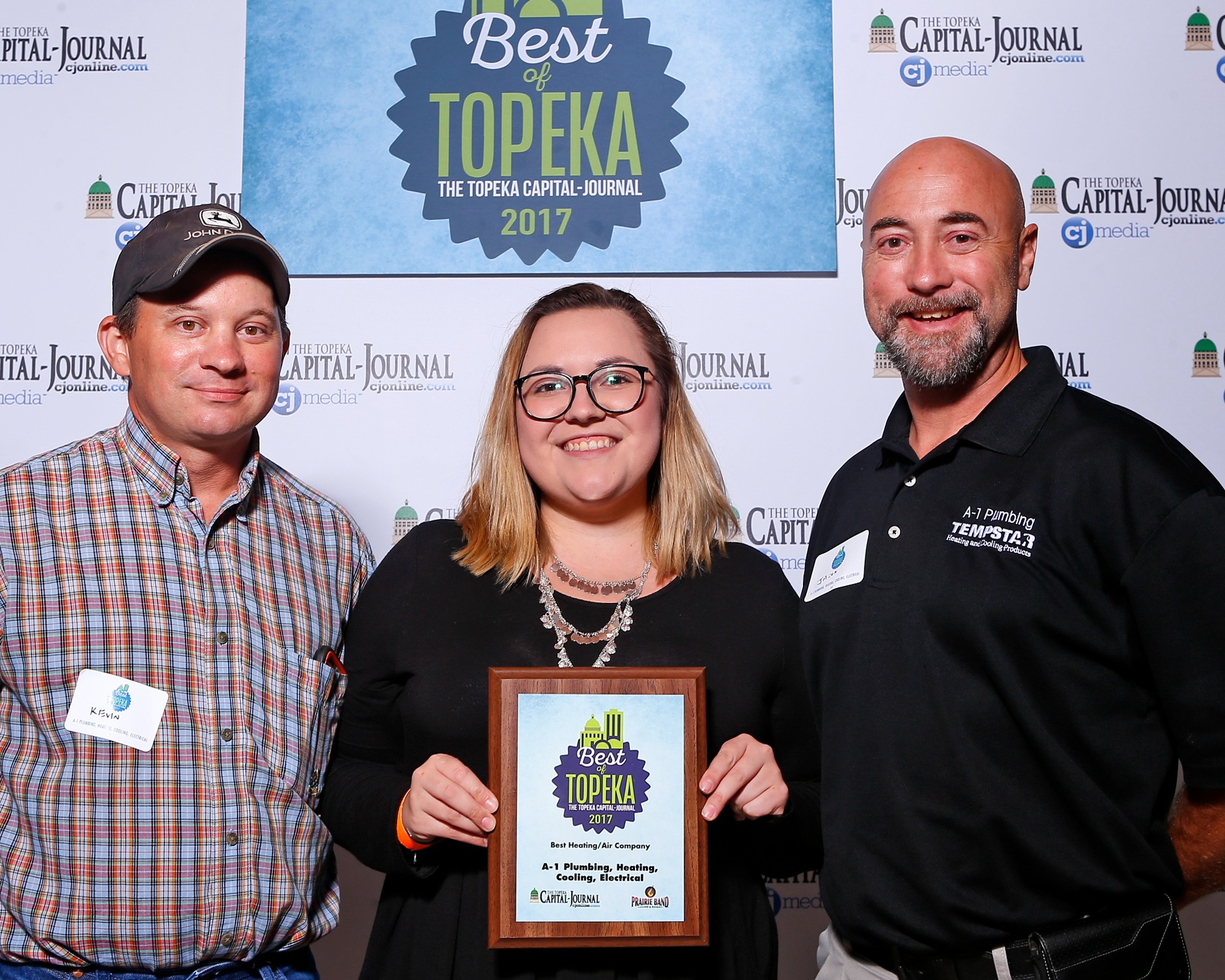 A-1 Plumbing Heating Cooling Electrical receiving a Best of Topeka award from the Topeka Capital-Journal